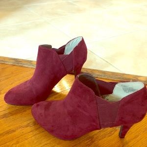 Suede cranberry in color heels.